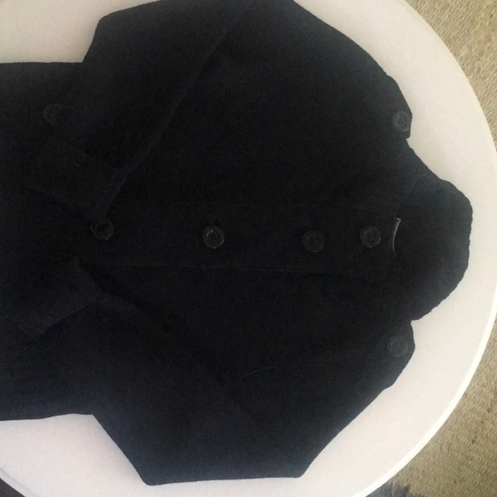Black Carlisle cardigan sweater.